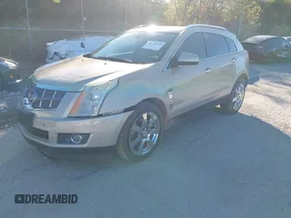 2011 Cadillac SRX Performance Collection with VIN 3GYFNBEY3BS529406, listed as a IAAI auction lot 40926089 with 160,535 mi miles. Bid and sale history available at carsss.com. Image 2.