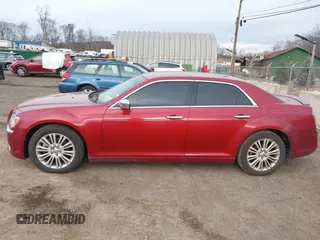 2012 Chrysler 300 C with VIN 2C3CCAKT4CH217217, listed as a IAAI auction lot 41502473 with 193,258 mi miles and . Bid and sale history available at DreamBid. Image 14.