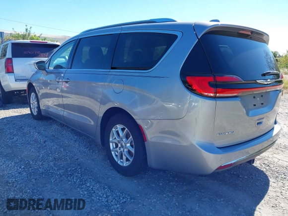 2021 Chrysler Pacifica Touring L with VIN 2C4RC1BG3MR560234, listed as a IAAI auction lot 40926673 with 27,830 mi miles and . Bid and sale history available at DreamBid. Image 3.
