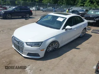 2017 Audi A4 Premium with VIN WAUANAF44HN002447, listed as a IAAI auction lot 42589741 with 71,960 mi miles and . Bid and sale history available at DreamBid. Image 2.