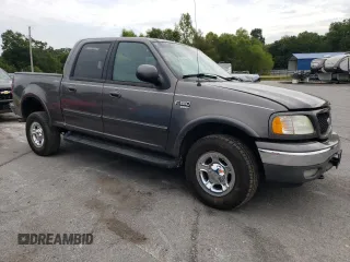 2002 Ford F-150 XLT with VIN 1FTRW08662KC45830, listed as a Copart auction lot 69485294 with 218,248 mi miles and Salvage Title. Bid and sale history available at carsss.com. Image 4.