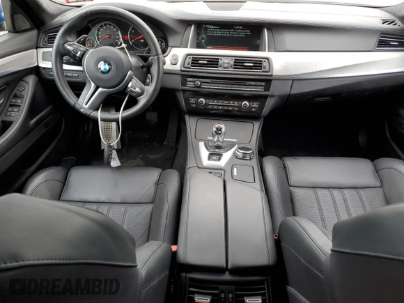 2014 BMW M5 z VIN WBSFV9C5XED097563, wystawiony jako Copart lot #72175354 z przebiegiem 73 406 mil mil oraz Szkody całkowita. Historia ofert i sprzedaży dostępna na DreamBid. Obrazek 8.