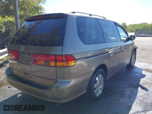 2003 Honda Odyssey EX-L z VIN 5FNRL180X3B055800, wystawiony jako IAAI lot #42053575 z przebiegiem 203 398 mil mil oraz . Historia ofert i sprzedaży dostępna na DreamBid. Obrazek 4.