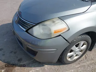 2007 Nissan Versa SL with VIN 3N1BC11E47L404371, listed as a IAAI auction lot 40309667 with 131,954 mi miles and . Bid and sale history available at DreamBid. Image 6.