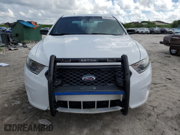 2015 Ford Police Interceptor with VIN 1FAHP2L82FG203554, listed as a Copart auction lot 73117244 with 99,385 mi miles and Clean title. Bid and sale history available at DreamBid. Image 5.