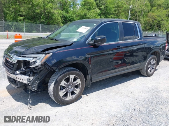 2017 Honda Ridgeline RTL with VIN 5FPYK3F51HB013989, listed as a IAAI auction lot 42206513 with 146,124 mi miles and . Bid and sale history available at DreamBid. Image 2.