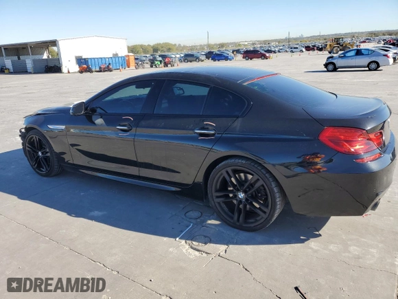 2016 BMW 6 Series 640i with VIN WBA6D0C58GG432405, listed as a Copart auction lot 81818864 with 100,700 mi miles and Salvage Title. Bid and sale history available at carsss.com. Image 2.
