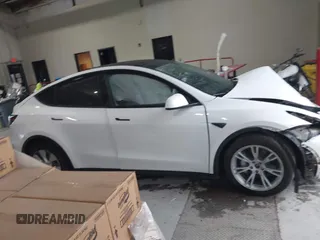 2023 Tesla Model Y Long Range z VIN 7SAYGAEEXPF789037, wystawiony jako IAAI lot #41551605 z przebiegiem 8 630 mil mil oraz . Historia ofert i sprzedaży dostępna na DreamBid. Obrazek 13.
