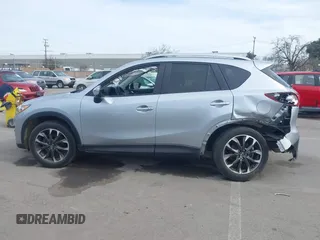 2016 Mazda CX-5 Grand Touring with VIN JM3KE2DY9G0723921, listed as a IAAI auction lot 41681522 with 83,893 mi miles. Bid and sale history available at carsss.com. Image 14.