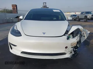 2021 Tesla Model 3 Long Range with VIN 5YJ3E1EB0MF009965, listed as a IAAI auction lot 41478233 with 31,713 mi miles and . Bid and sale history available at DreamBid. Image 12.