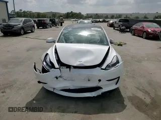 2023 Tesla Model 3 with VIN 5YJ3E1EA8PF499535, listed as a Copart auction lot 59974115 with 18,365 mi miles and Salvage title. Bid and sale history available at DreamBid. Image 13.
