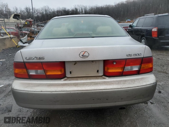 1999 Lexus ES 300 Luxury Sport Sdn with VIN JT8BF28GXX5067205, listed as a Copart auction lot 83018394 with 170,573 mi miles and Salvage Title. Bid and sale history available at carsss.com. Image 6.