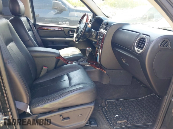 2006 GMC Envoy Denali with VIN 1GKES63M262344853, listed as a IAAI auction lot 42024960 with 183,066 mi miles. Bid and sale history available at carsss.com. Image 5.