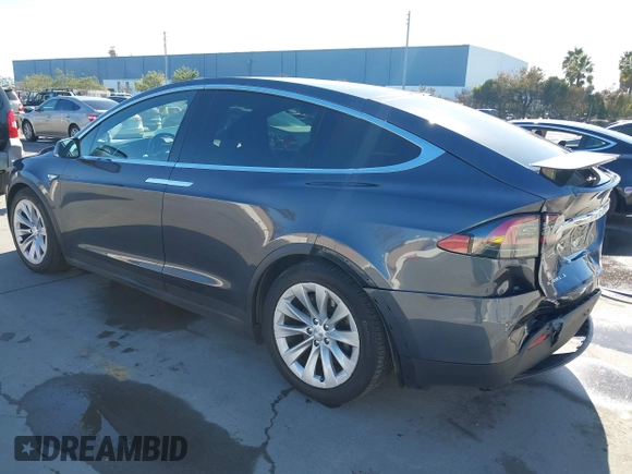 2016 Tesla Model X 70D with VIN 5YJXCBE24GF019450, listed as a IAAI auction lot 41517321 with 96,831 mi miles. Bid and sale history available at carsss.com. Image 3.