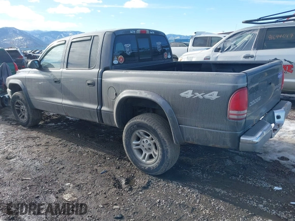 2004 Dodge Dakota SLT with VIN 1D7HG48N44S701906, listed as a IAAI auction lot 41662483 with 202,575 mi miles and . Bid and sale history available at carsss.com. Image 3.