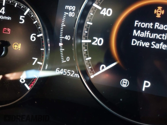 2022 Mazda CX-30 S Select z VIN 3MVDMBBL8NM448787, wystawiony jako IAAI lot #41577914 z przebiegiem 64 552 mil mil oraz . Historia ofert i sprzedaży dostępna na DreamBid. Obrazek 16.