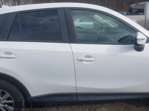2016 Mazda CX-5 Touring with VIN JM3KE2CY5G0791537, listed as a IAAI auction lot 41396276 with 42,095 mi miles. Bid and sale history available at carsss.com. Image 14.