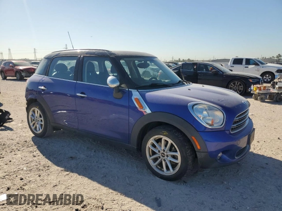 2015 MINI Countryman with VIN WMWZB3C53FWR44727, listed as a Copart auction lot 49456945 with 89,381 mi miles and Salvage Title. Bid and sale history available at DreamBid. Image 4.