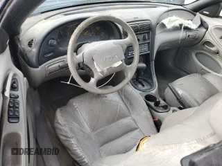 1998 Ford Mustang GT z VIN 1FAFP45X6WF186450, wystawiony jako Copart lot #45398475 z przebiegiem 124 697 mil mil oraz Szkoda całkowita • Salvage title. Historia ofert i sprzedaży dostępna na DreamBid. Obrazek 8.