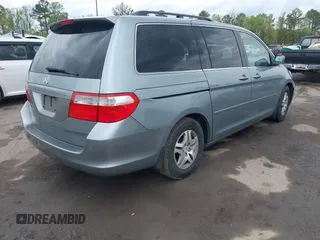2007 Honda Odyssey EX with VIN 5FNRL38487B018720, listed as a IAAI auction lot 42041940 with 388,509 mi miles and . Bid and sale history available at DreamBid. Image 4.