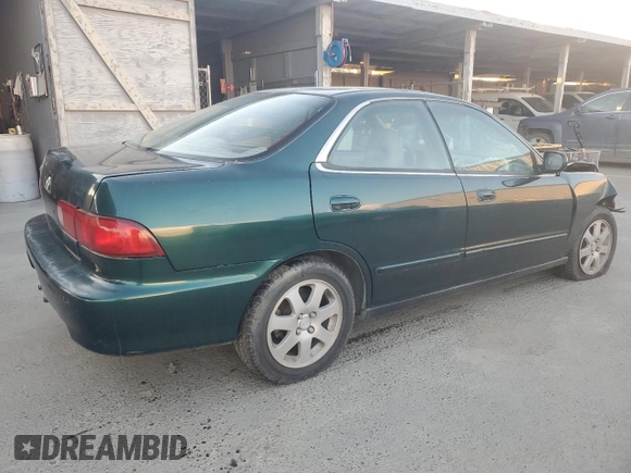 1999 Acura Integra with VIN JH4DB7665XS000928, listed as a Copart auction lot 80924344 with 198,981 mi miles and Salvage title. Bid and sale history available at DreamBid. Image 3.