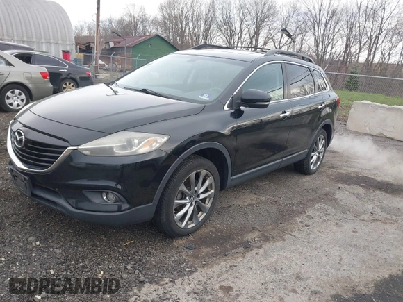 2015 Mazda CX-9 Grand Touring z VIN JM3TB3DV6F0464926, wystawiony jako IAAI lot #42035670 z przebiegiem 168 257 mil mil oraz . Historia ofert i sprzedaży dostępna na DreamBid. Obrazek 17.