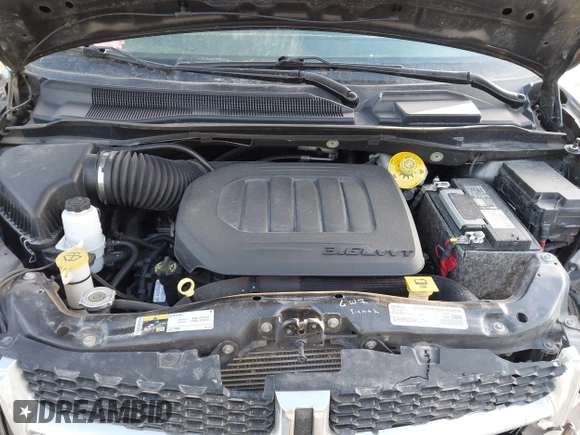 2019 Dodge Grand Caravan SXT with VIN 2C4RDGCG0KR633684, listed as a IAAI auction lot 41460470 with 101,801 mi miles. Bid and sale history available at carsss.com. Image 10.