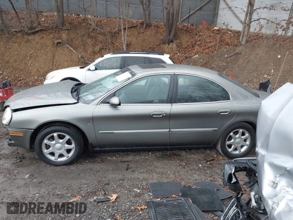 2003 Mercury Sable LS Premium with VIN 1MEFM55S13G612515, listed as a IAAI auction lot 41837589 with 62,173 mi miles and . Bid and sale history available at DreamBid. Image 14.
