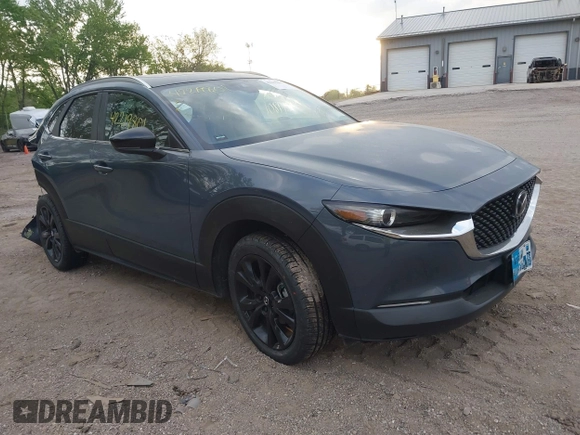 2023 Mazda CX-30 S Carbon Edition with VIN 3MVDMBCM4PM577619, listed as a IAAI auction lot 42219801 with 24,784 mi miles and . Bid and sale history available at DreamBid. Image 1.