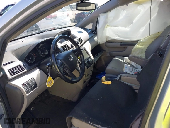 2014 Honda Odyssey Touring с VIN 5FNRL5H98EB070983, выставлен на аукционе IAAI как лот 42328380 с пробегом Не указан миль и . История ставок и продаж доступна на DreamBid. Изображение 5.