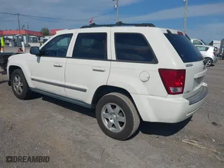 2010 Jeep Grand Cherokee Laredo with VIN 1J4PS4GK6AC112447, listed as a IAAI auction lot 42086245 with 150,875 mi miles. Bid and sale history available at carsss.com. Image 3.
