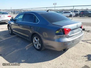 2015 Volkswagen Passat 1.8T S with VIN 1VWAS7A38FC116213, listed as a IAAI auction lot 41749385 with 169,599 mi miles. Bid and sale history available at carsss.com. Image 3.