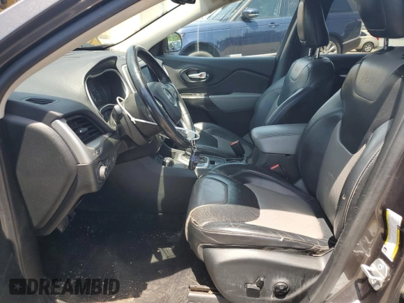 2014 Jeep Cherokee Limited with VIN 1C4PJMDS4EW211057, listed as a Copart auction lot 63448375 with Not provided miles and Salvage title. Bid and sale history available at DreamBid. Image 7.