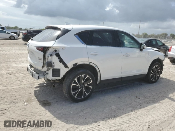 2023 Mazda CX-5 S Premium with VIN JM3KFBDM6P0146078, listed as a Copart auction lot 55654665 with 13,645 mi miles and Salvage Title. Bid and sale history available at DreamBid. Image 3.