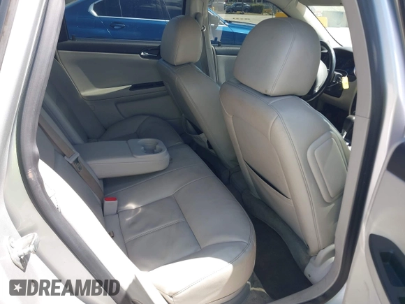 2014 Chevrolet Impala LT with VIN 2G1WB5E34E1178129, listed as a IAAI auction lot 42602823 with 132,713 mi miles and . Bid and sale history available at DreamBid. Image 8.