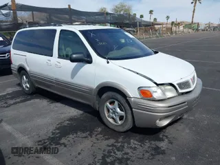 2002 Pontiac Montana with VIN 1GMDX03EX2D120237, listed as a IAAI auction lot 41858448 with 128,022 mi miles and . Bid and sale history available at DreamBid. Image 1.