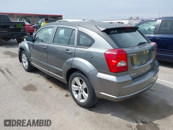 2012 Dodge Caliber SXT with VIN 1C3CDWDA6CD506019, listed as a IAAI auction lot 41999560 with 146,446 mi miles and . Bid and sale history available at DreamBid. Image 3.