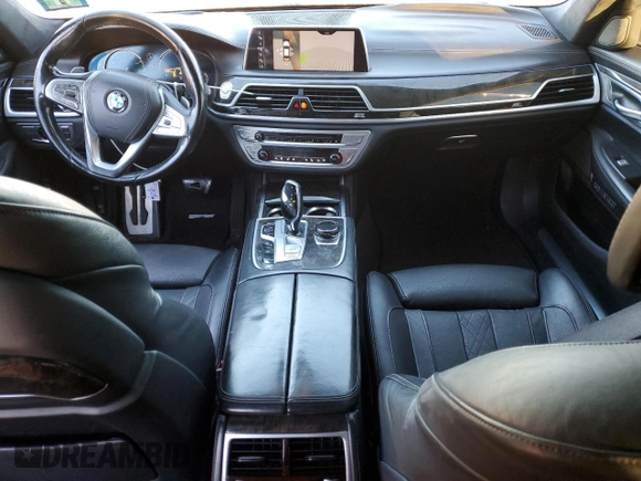 2017 BMW 7 Series with VIN WBA7F2C32HG422866, listed as a Copart auction lot 76177184 with 146,565 mi miles and Salvage Title. Bid and sale history available at DreamBid. Image 8.