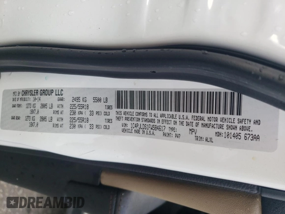 2015 Jeep Cherokee Limited with VIN 1C4PJLDS1FW584617, listed as a Copart auction lot 73677314 with Not Provided miles and Salvage Title. Bid and sale history available at DreamBid. Image 14.