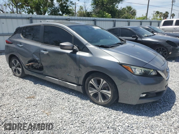 2018 Nissan LEAF S with VIN 1N4AZ1CP2JC301612, listed as a Copart auction lot 52483345 with 99,276 mi miles and Non Repairable. Bid and sale history available at DreamBid. Image 4.