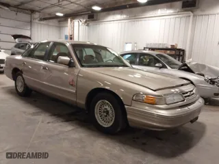 1995 Ford Crown Victoria LX with VIN 2FALP74W0SX195270, listed as a IAAI auction lot 41840082 with 139,967 mi miles. Bid and sale history available at carsss.com. Image 1.
