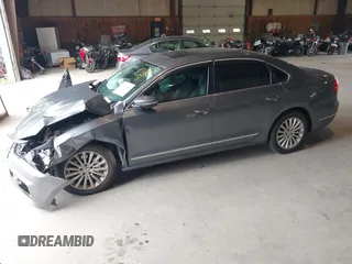 2016 Volkswagen Passat 1.8T SE with VIN 1VWBT7A35GC011129, listed as a IAAI auction lot 39977788 with 123,007 mi miles. Bid and sale history available at carsss.com. Image 2.