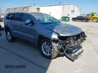 2018 Jeep Grand Cherokee Laredo E with VIN 1C4RJFAG8JC130465, listed as a IAAI auction lot 41789688 with 133,299 mi miles. Bid and sale history available at carsss.com. Image 1.
