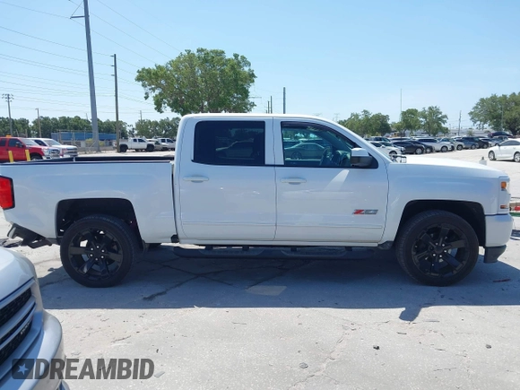 2017 Chevrolet Silverado 1500 LT with VIN 3GCUKREC4HG391101, listed as a IAAI auction lot 42129151 with 84,670 mi miles and . Bid and sale history available at DreamBid. Image 13.