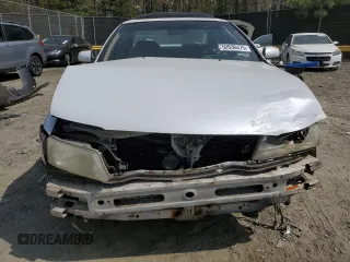 1997 Nissan Maxima GXE с VIN JN1CA21D1VT828042, выставлен на аукционе Copart как лот 52630475 с пробегом 351 073 миль миль и Списание • Salvage title. История ставок и продаж доступна на DreamBid. Изображение 5.
