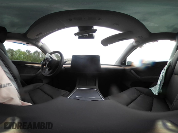 2025 Tesla Model Y Long Range with VIN 7SAYGDED7SA373235, listed as a IAAI auction lot 42100950 with 650 mi miles and . Bid and sale history available at DreamBid. Image 19.