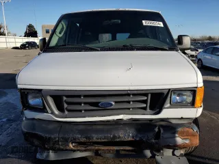 2005 Ford Econoline Passenger XL with VIN 1FBNE31L15HB23580, listed as a Copart auction lot 85060224 with 222,935 mi miles and Salvage Title. Bid and sale history available at carsss.com. Image 5.
