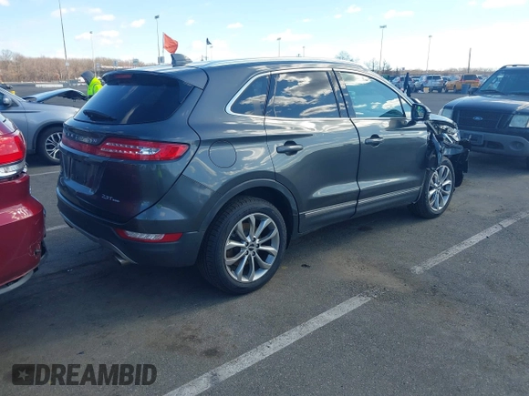 2017 Lincoln MKC Select with VIN 5LMTJ2DH9HUL51637, listed as a IAAI auction lot 41667429 with 40,509 mi miles and . Bid and sale history available at DreamBid. Image 4.