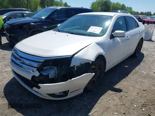 2010 Ford Fusion SE with VIN 3FAHP0HA7AR268272, listed as a IAAI auction lot 41971679 with 227,868 mi miles and . Bid and sale history available at DreamBid. Image 2.