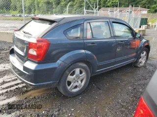 2007 Dodge Caliber SXT z VIN 1B3HB48B57D364154, wystawiony jako Copart lot #58973225 z przebiegiem 205 693 mil mil oraz Szkoda całkowita • Salvage title. Historia ofert i sprzedaży dostępna na DreamBid. Obrazek 3.